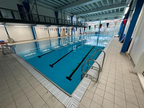 Barnet swimming lesson venue with lane ropes and poolside access